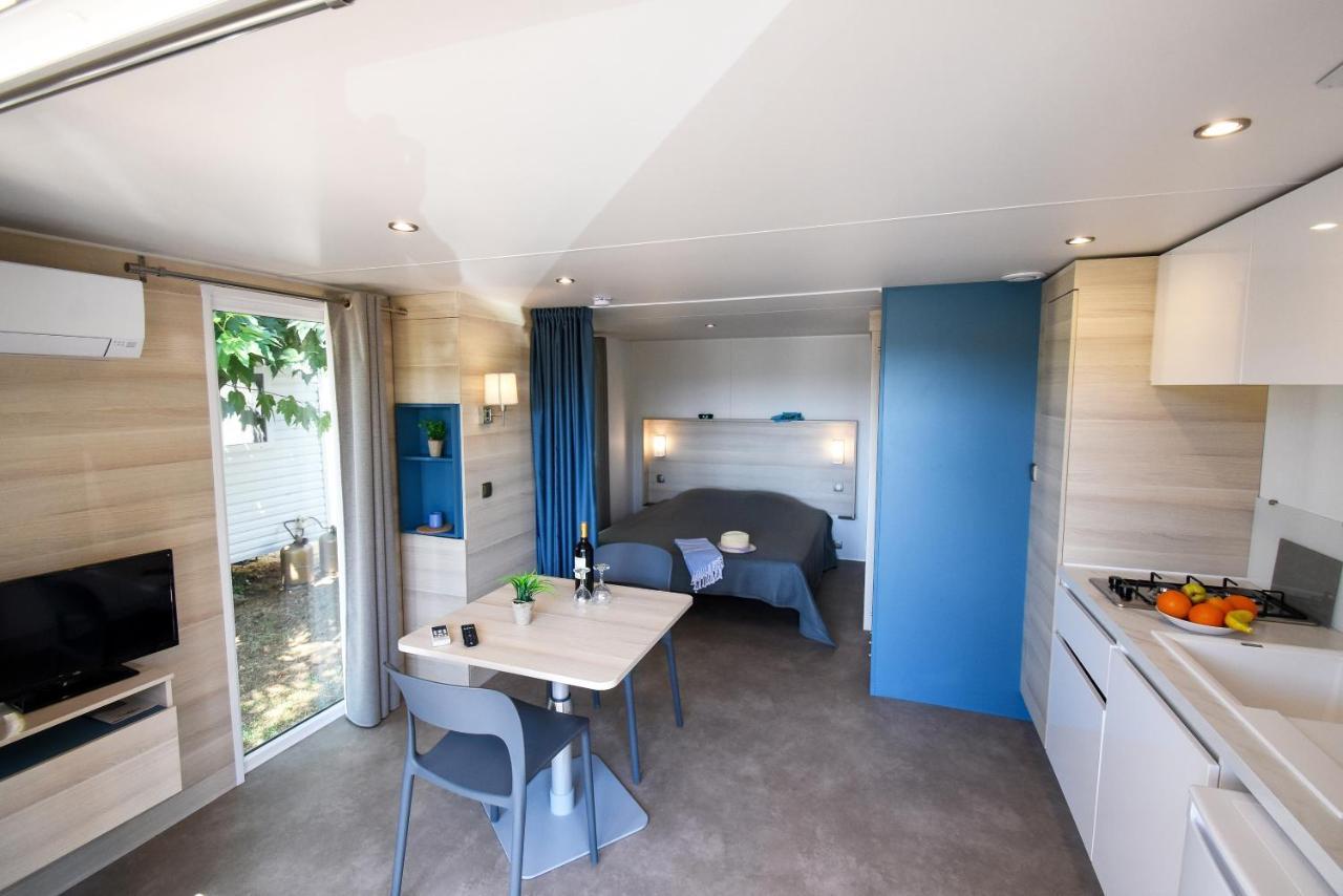 KeyWest – 2 personnes Draps tissus et serviettes fournis TV et climatisation terrasse couverte